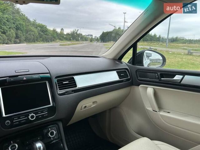 Черный Фольксваген Туарег, объемом двигателя 2.97 л и пробегом 299 тыс. км за 18700 $, фото 23 на Automoto.ua