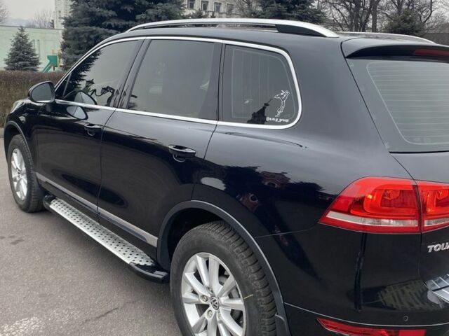 Черный Фольксваген Туарег, объемом двигателя 3 л и пробегом 280 тыс. км за 16800 $, фото 7 на Automoto.ua