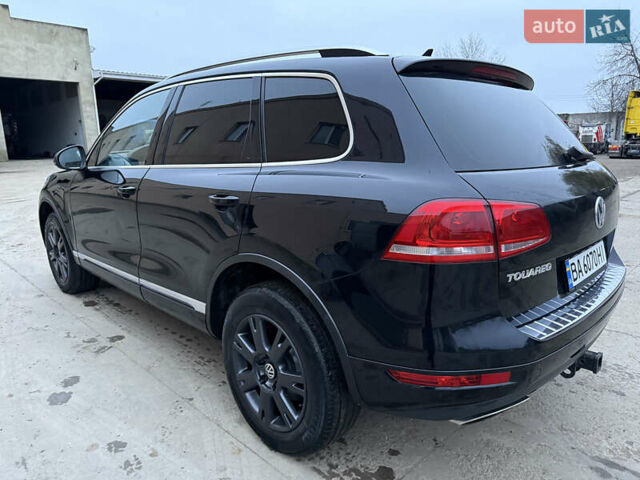 Черный Фольксваген Туарег, объемом двигателя 3 л и пробегом 285 тыс. км за 13800 $, фото 3 на Automoto.ua