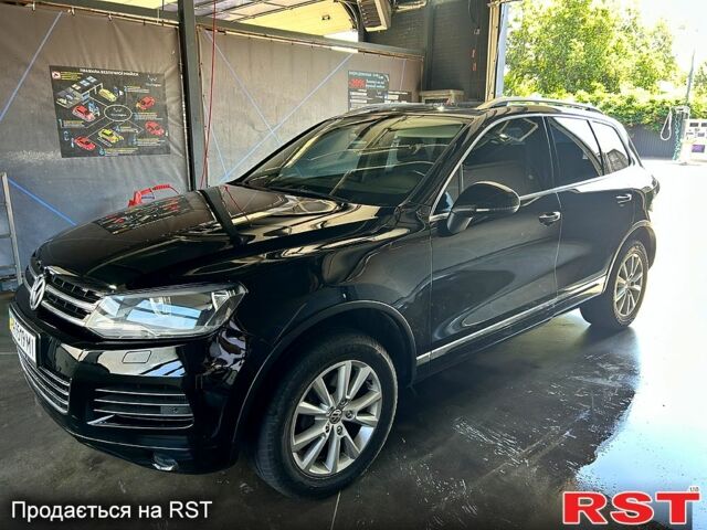 Чорний Фольксваген Туарег, об'ємом двигуна 3 л та пробігом 242 тис. км за 18750 $, фото 2 на Automoto.ua