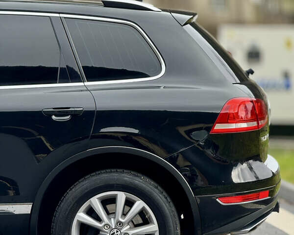 Черный Фольксваген Туарег, объемом двигателя 2.97 л и пробегом 310 тыс. км за 15200 $, фото 4 на Automoto.ua