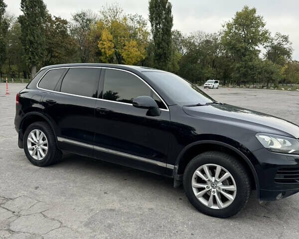 Черный Фольксваген Туарег, объемом двигателя 2.97 л и пробегом 160 тыс. км за 21000 $, фото 2 на Automoto.ua