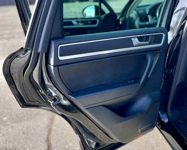 Чорний Фольксваген Туарег, об'ємом двигуна 3 л та пробігом 91 тис. км за 29900 $, фото 37 на Automoto.ua