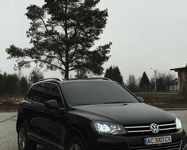 Чорний Фольксваген Туарег, об'ємом двигуна 2.97 л та пробігом 203 тис. км за 24000 $, фото 1 на Automoto.ua