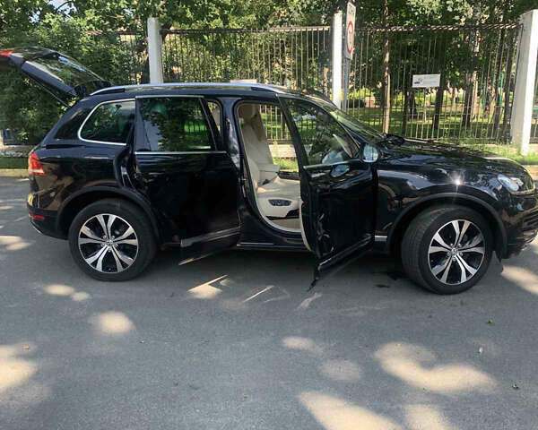 Чорний Фольксваген Туарег, об'ємом двигуна 3 л та пробігом 269 тис. км за 19999 $, фото 1 на Automoto.ua