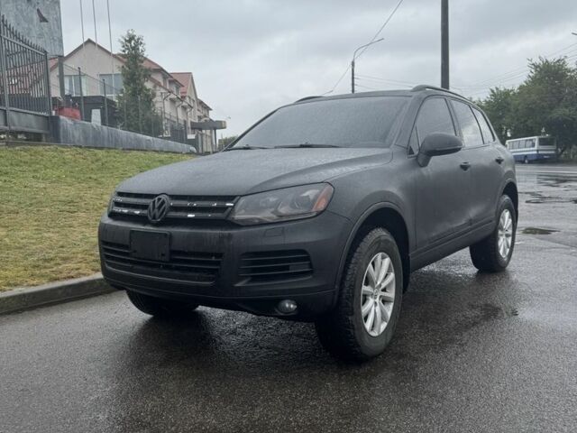 Чорний Фольксваген Туарег, об'ємом двигуна 3 л та пробігом 360 тис. км за 11562 $, фото 1 на Automoto.ua