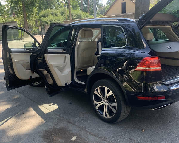 Чорний Фольксваген Туарег, об'ємом двигуна 3 л та пробігом 269 тис. км за 19999 $, фото 6 на Automoto.ua