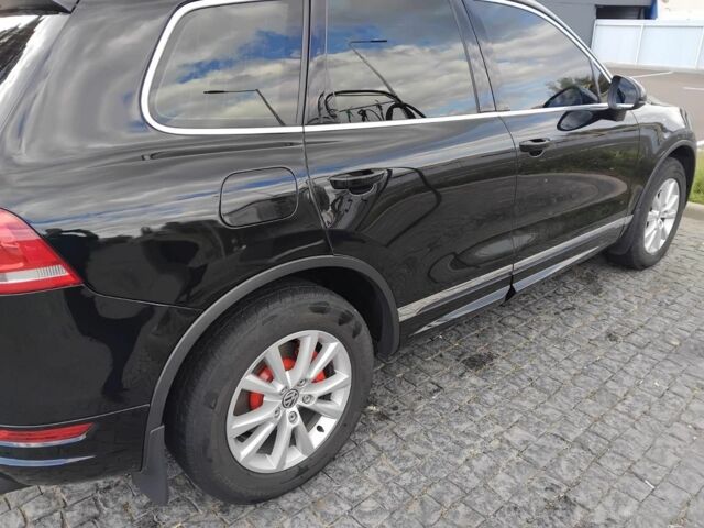 Чорний Фольксваген Туарег, об'ємом двигуна 3 л та пробігом 290 тис. км за 16300 $, фото 4 на Automoto.ua