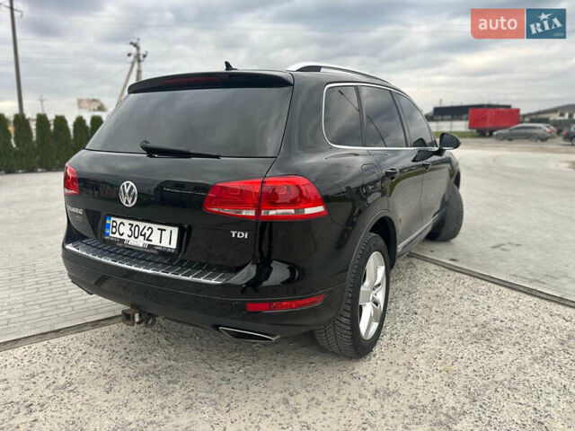 Черный Фольксваген Туарег, объемом двигателя 2.97 л и пробегом 335 тыс. км за 15500 $, фото 3 на Automoto.ua