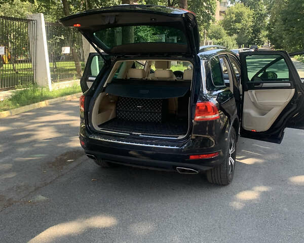 Чорний Фольксваген Туарег, об'ємом двигуна 3 л та пробігом 269 тис. км за 19999 $, фото 4 на Automoto.ua