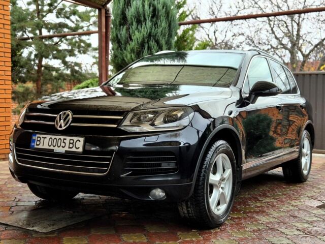 Черный Фольксваген Туарег, объемом двигателя 3 л и пробегом 250 тыс. км за 17300 $, фото 1 на Automoto.ua