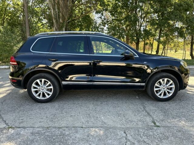 Черный Фольксваген Туарег, объемом двигателя 3 л и пробегом 357 тыс. км за 17700 $, фото 6 на Automoto.ua