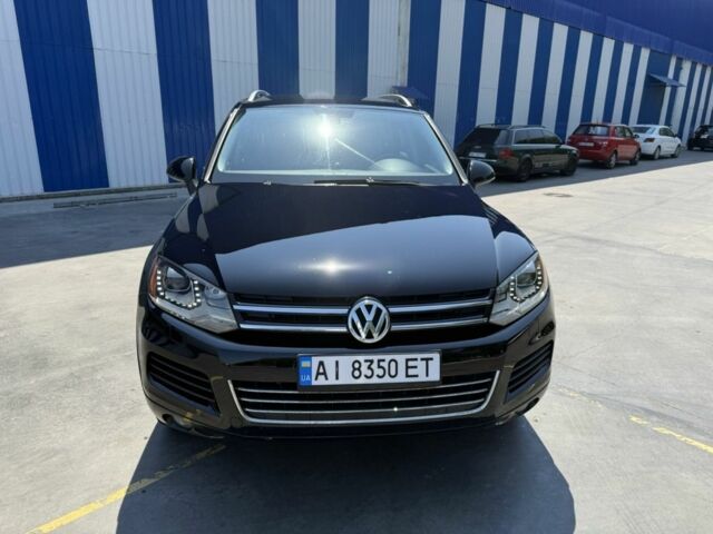 Черный Фольксваген Туарег, объемом двигателя 3 л и пробегом 315 тыс. км за 14850 $, фото 2 на Automoto.ua