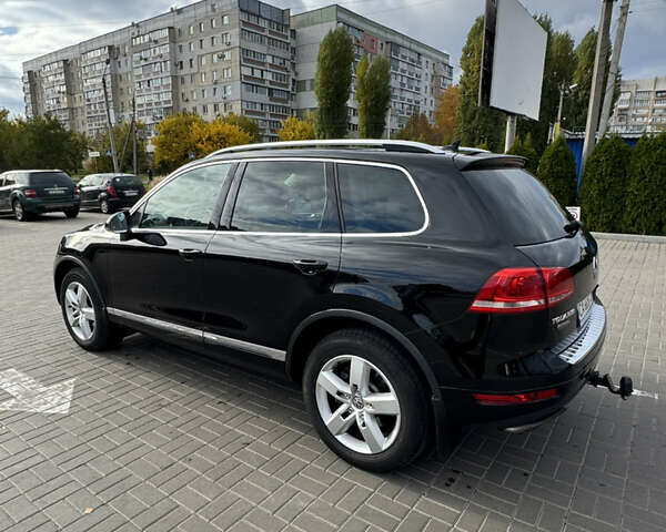 Чорний Фольксваген Туарег, об'ємом двигуна 2.97 л та пробігом 382 тис. км за 16700 $, фото 7 на Automoto.ua