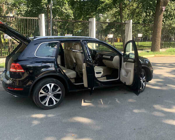 Чорний Фольксваген Туарег, об'ємом двигуна 3 л та пробігом 269 тис. км за 19999 $, фото 2 на Automoto.ua