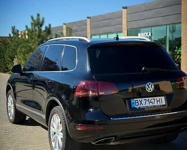 Черный Фольксваген Туарег, объемом двигателя 3 л и пробегом 213 тыс. км за 22300 $, фото 1 на Automoto.ua