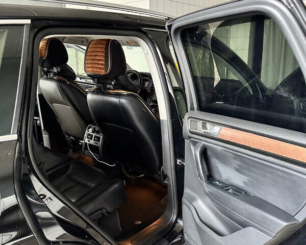 Черный Фольксваген Туарег, объемом двигателя 3.6 л и пробегом 320 тыс. км за 15500 $, фото 2 на Automoto.ua