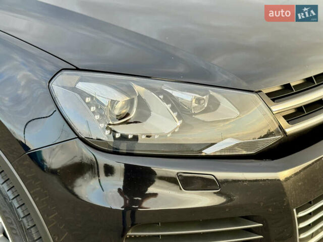 Черный Фольксваген Туарег, объемом двигателя 3 л и пробегом 275 тыс. км за 20999 $, фото 7 на Automoto.ua