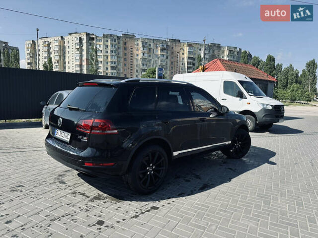 Чорний Фольксваген Туарег, об'ємом двигуна 2.97 л та пробігом 309 тис. км за 19500 $, фото 2 на Automoto.ua