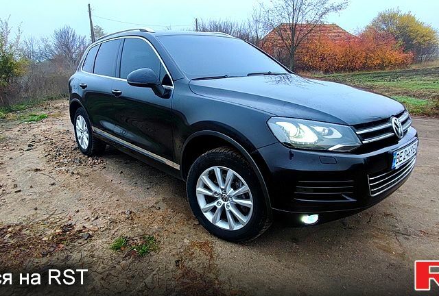 Черный Фольксваген Туарег, объемом двигателя 3 л и пробегом 245 тыс. км за 19000 $, фото 2 на Automoto.ua