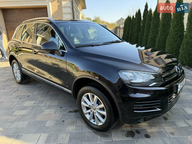 Фольксваген Туарег 2013 в Черновцах на Automoto.ua Черный Фольксваген Туарег, объемом двигателя 2.97 л и пробегом 276 тыс. км за 18900 $, фото 18 на Automoto.ua