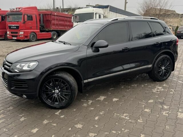 Черный Фольксваген Туарег, объемом двигателя 2.97 л и пробегом 157 тыс. км за 24500 $, фото 1 на Automoto.ua