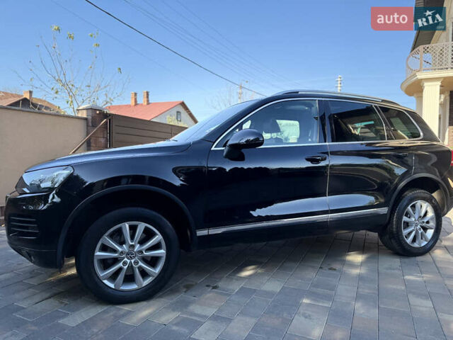 Фольксваген Туарег 2013 в Черновцах на Automoto.ua Черный Фольксваген Туарег, объемом двигателя 2.97 л и пробегом 276 тыс. км за 18900 $, фото 31 на Automoto.ua
