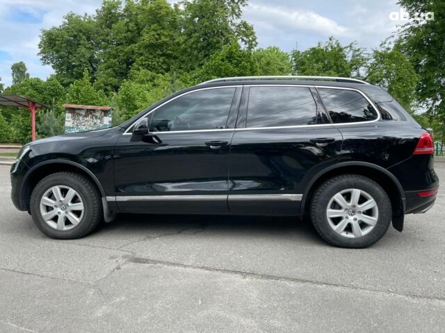 Чорний Фольксваген Туарег, об'ємом двигуна 3 л та пробігом 197 тис. км за 27490 $, фото 14 на Automoto.ua