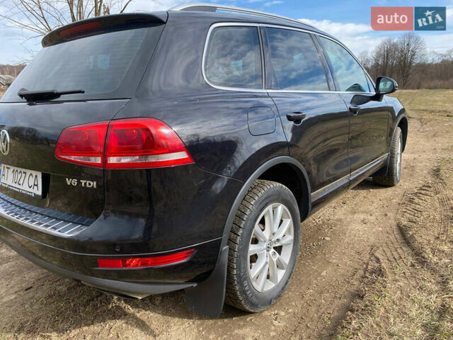 Чорний Фольксваген Туарег, об'ємом двигуна 3 л та пробігом 430 тис. км за 18500 $, фото 4 на Automoto.ua