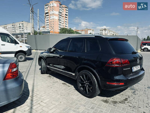 Чорний Фольксваген Туарег, об'ємом двигуна 2.97 л та пробігом 309 тис. км за 19500 $, фото 1 на Automoto.ua