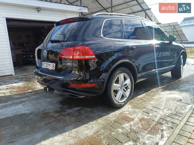 Черный Фольксваген Туарег, объемом двигателя 3.6 л и пробегом 146 тыс. км за 18000 $, фото 2 на Automoto.ua