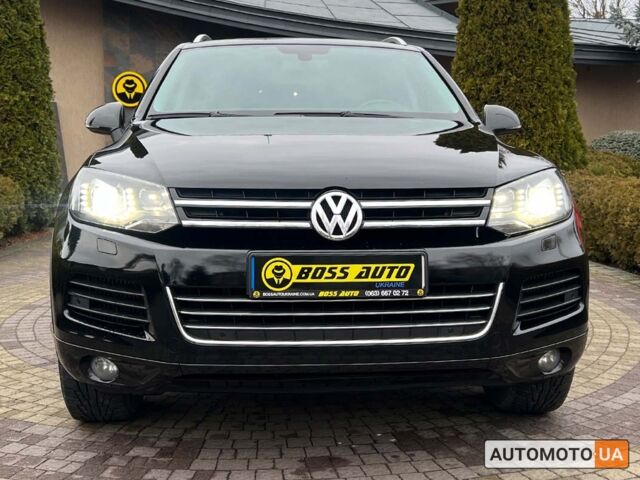 Чорний Фольксваген Туарег, об'ємом двигуна 3 л та пробігом 191 тис. км за 25300 $, фото 1 на Automoto.ua