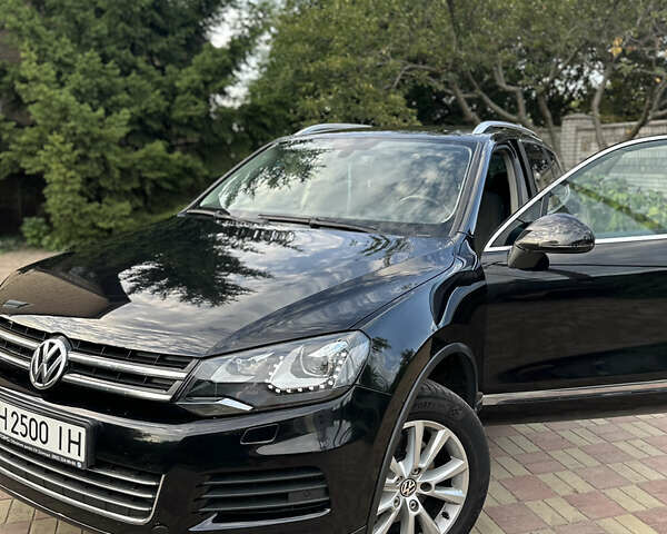 Черный Фольксваген Туарег, объемом двигателя 2.97 л и пробегом 342 тыс. км за 18000 $, фото 1 на Automoto.ua