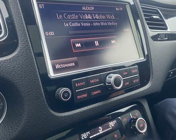 Черный Фольксваген Туарег, объемом двигателя 2.97 л и пробегом 348 тыс. км за 19500 $, фото 58 на Automoto.ua