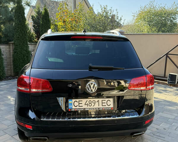 Фольксваген Туарег 2013 в Черновцах на Automoto.ua Черный Фольксваген Туарег, объемом двигателя 2.97 л и пробегом 276 тыс. км за 18900 $, фото 10 на Automoto.ua