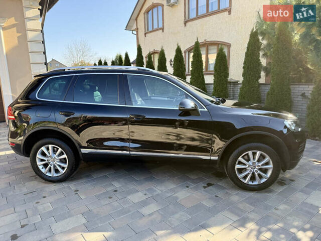 Фольксваген Туарег 2013 в Черновцах на Automoto.ua Черный Фольксваген Туарег, объемом двигателя 2.97 л и пробегом 276 тыс. км за 18900 $, фото 20 на Automoto.ua