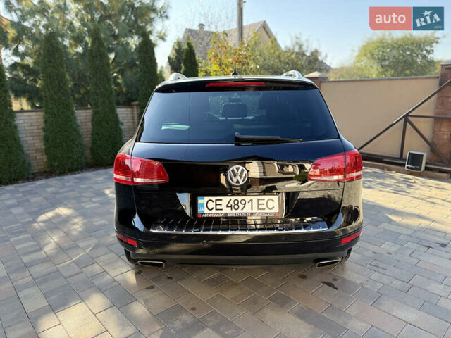 Фольксваген Туарег 2013 в Черновцах на Automoto.ua Черный Фольксваген Туарег, объемом двигателя 2.97 л и пробегом 276 тыс. км за 18900 $, фото 24 на Automoto.ua