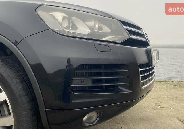 Черный Фольксваген Туарег, объемом двигателя 2.97 л и пробегом 348 тыс. км за 19500 $, фото 61 на Automoto.ua