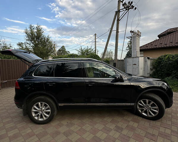 Черный Фольксваген Туарег, объемом двигателя 2.97 л и пробегом 342 тыс. км за 18000 $, фото 10 на Automoto.ua