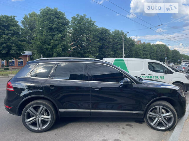 Черный Фольксваген Туарег, объемом двигателя 2.97 л и пробегом 320 тыс. км за 21000 $, фото 1 на Automoto.ua