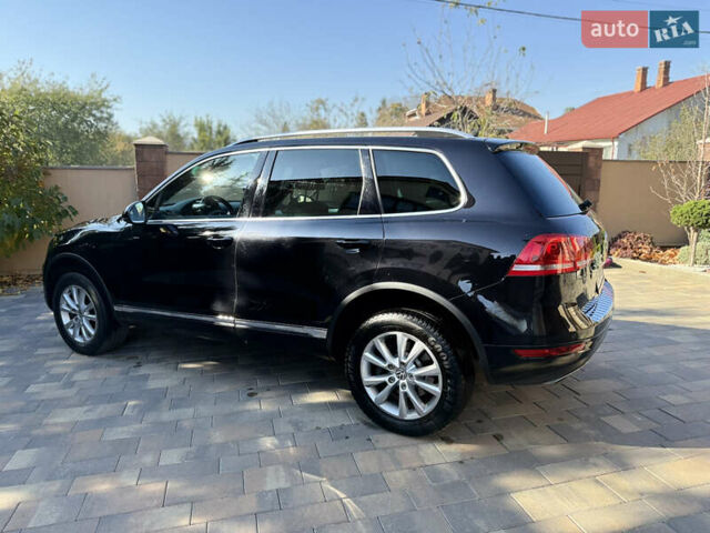 Фольксваген Туарег 2013 в Черновцах на Automoto.ua Черный Фольксваген Туарег, объемом двигателя 2.97 л и пробегом 276 тыс. км за 18900 $, фото 27 на Automoto.ua