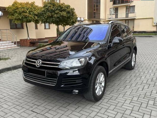 Фольксваген Туарег 2013 в Черновцах на Automoto.ua Черный Фольксваген Туарег, объемом двигателя 2.97 л и пробегом 250 тыс. км за 19900 $, фото 13 на Automoto.ua