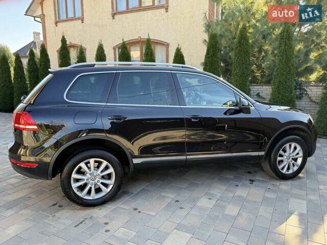 Фольксваген Туарег 2013 в Черновцах на Automoto.ua Черный Фольксваген Туарег, объемом двигателя 2.97 л и пробегом 276 тыс. км за 18900 $, фото 12 на Automoto.ua