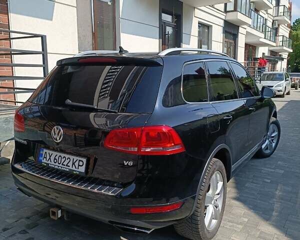 Чорний Фольксваген Туарег, об'ємом двигуна 3.6 л та пробігом 183 тис. км за 19500 $, фото 4 на Automoto.ua