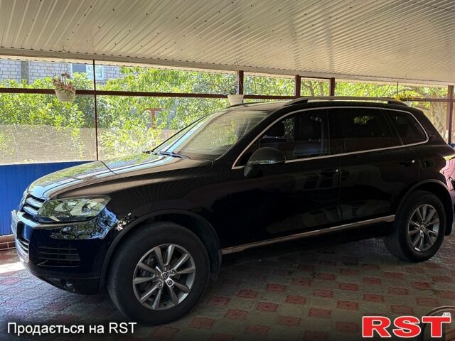 Черный Фольксваген Туарег, объемом двигателя 3 л и пробегом 199 тыс. км за 19800 $, фото 2 на Automoto.ua
