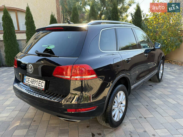 Фольксваген Туарег 2013 в Черновцах на Automoto.ua Черный Фольксваген Туарег, объемом двигателя 2.97 л и пробегом 276 тыс. км за 18900 $, фото 11 на Automoto.ua