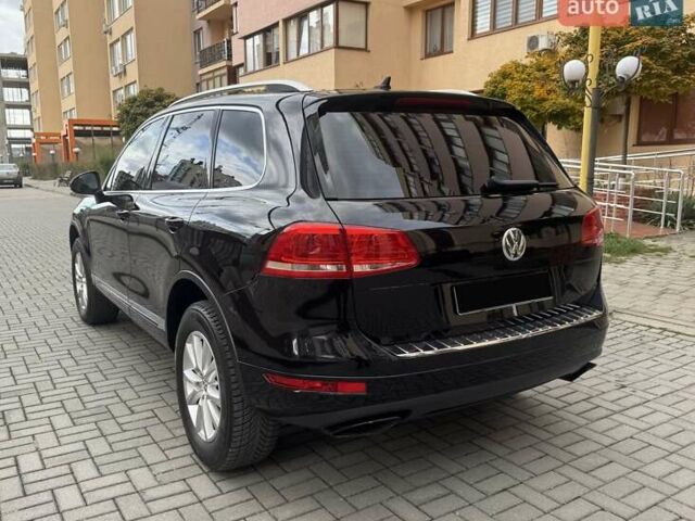 Фольксваген Туарег 2013 в Черновцах на Automoto.ua Черный Фольксваген Туарег, объемом двигателя 2.97 л и пробегом 250 тыс. км за 19900 $, фото 6 на Automoto.ua