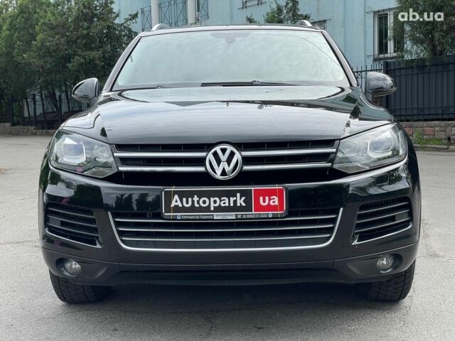 Чорний Фольксваген Туарег, об'ємом двигуна 3 л та пробігом 197 тис. км за 27490 $, фото 2 на Automoto.ua