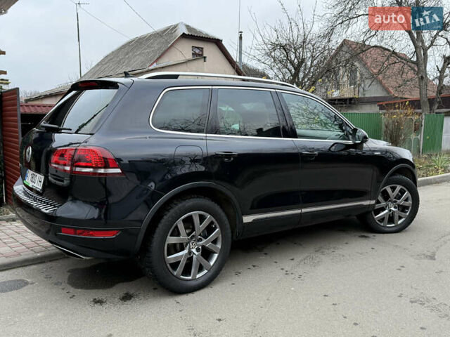 Чорний Фольксваген Туарег, об'ємом двигуна 4.13 л та пробігом 258 тис. км за 28500 $, фото 3 на Automoto.ua