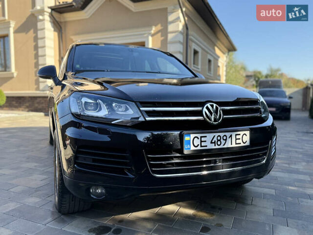 Фольксваген Туарег 2013 в Черновцах на Automoto.ua Черный Фольксваген Туарег, объемом двигателя 2.97 л и пробегом 276 тыс. км за 18900 $, фото 17 на Automoto.ua